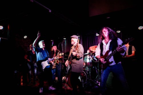 rock band performing on stage - concert stock pictures, royalty-free photos & images