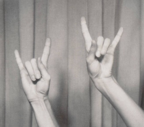 rock n roll hand symbol, gesturing music hand sign, horn sign hands music fan concert - concert stock pictures, royalty-free photos & images