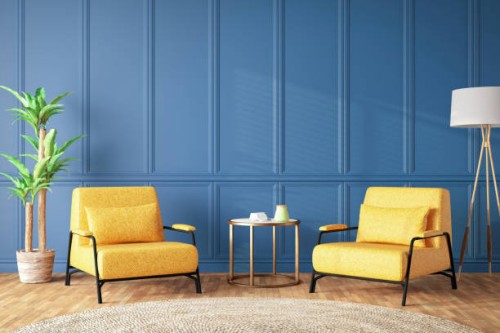 room with empty blue wall panelling with two armchairs - home decoration stock pictures, royalty-free photos & images
