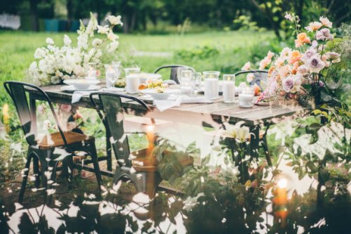 rustic wooden table with elegant festive setting decorated with fresh pastel aromatic flowers. - garden decoration stock pictures, royalty-free photos & images