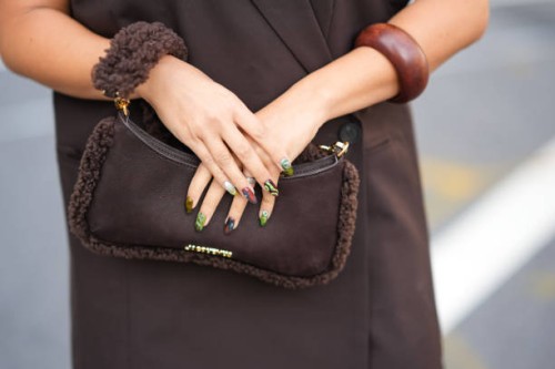 Samia Laaboudi wears dark brown fuzzy Jacquemus bag, outside Jason Wu, during the New York Fashion week Spring/Summer 2025 on September 08, 2024 in...