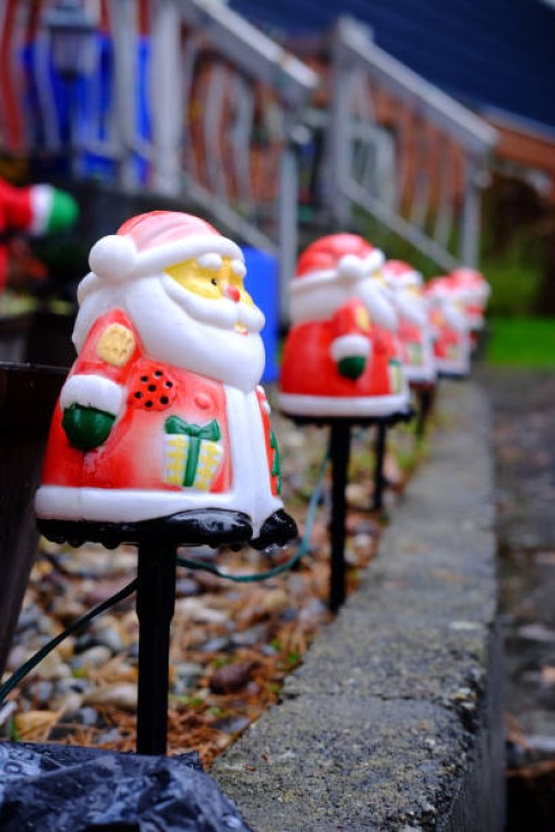 santa seen on the christmas day - garden decoration stock pictures, royalty-free photos & images