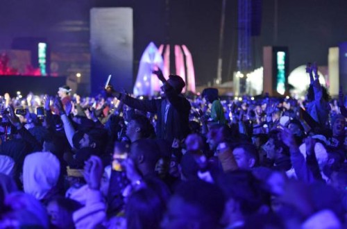 Saudi fans attend the "MDL Beast Fest", an electronic music festival, held in Banban on the outskirts of the Saudi capital Riyadh on December 19,...