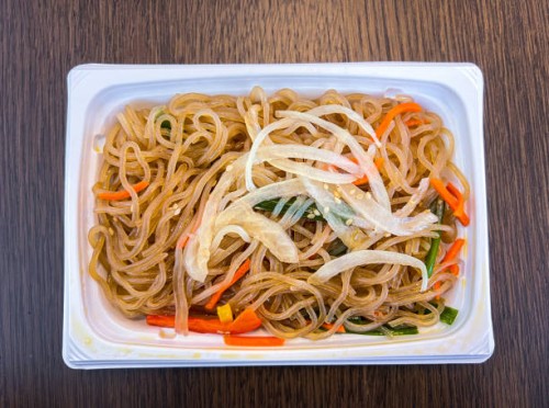 savory japchae stir-fried noodles side dish - junk food stock pictures, royalty-free photos & images