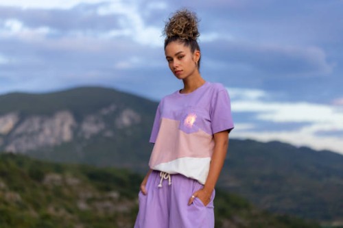scenic serenity in purple outfit - fashion stock pictures, royalty-free photos & images