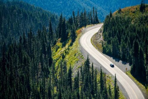 scenic view of mountains and road against sky. olympic national park, usa. - travel stock pictures, royalty-free photos & images