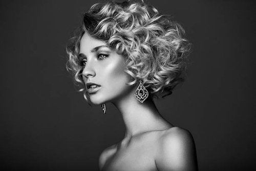 schöne frau mit eleganten frisur - hairstyle stock-fotos und bilder