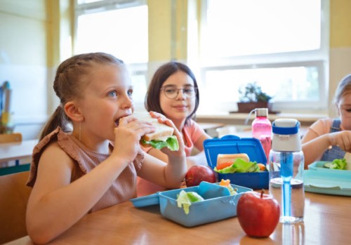 school children having lunch - food stock pictures, royalty-free photos & images