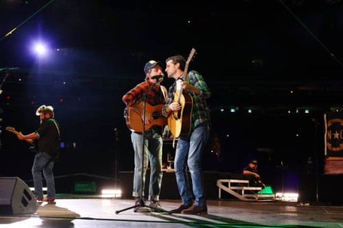 Scott Avett and Seth Avett of The Avett Brothers perform onstage at the Concert For Carolina Benefit Concert at Bank of America Stadium on October...