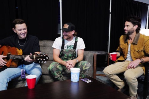 Scotty McCreery, Chase Rice and Matt Thomas of Parmalee are seen backstage at the Concert For Carolina Benefit Concert at Bank of America Stadium on...