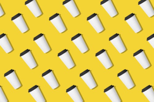 seamless repeated pattern of a disposable coffee cup on a yellow background - junk food stock pictures, royalty-free photos & images