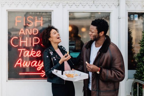 seaside couples - junk food stock pictures, royalty-free photos & images
