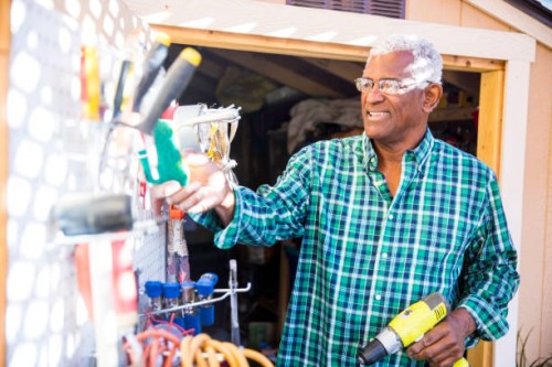 senior black man in tool shed - home decoration stock pictures, royalty-free photos & images