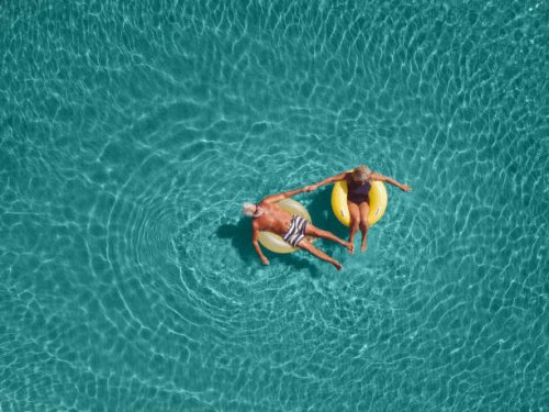 senior couple enjoy sea water - travel stock pictures, royalty-free photos & images