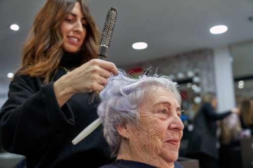 senior woman getting new hair cut at beauty salon - hairstyle stock pictures, royalty-free photos & images