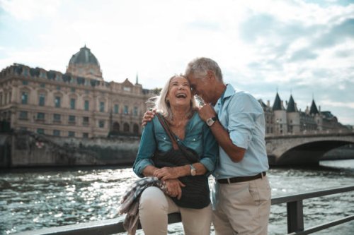 seniors taking a break in paris relaxing by the seine river in paris - travel stock pictures, royalty-free photos & images