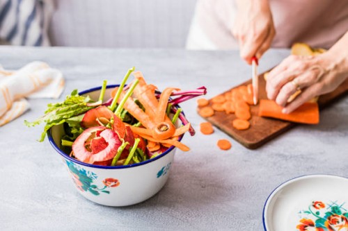 separating vegetable leftovers for compost - food stock pictures, royalty-free photos & images