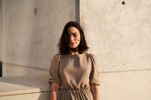 serious portrait of pretty caucasian young lady looking at camera. - fashion stock pictures, royalty-free photos & images