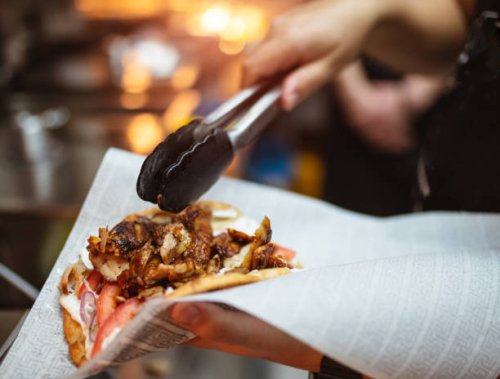 service worker preparing gyros pita - junk food stock pictures, royalty-free photos & images