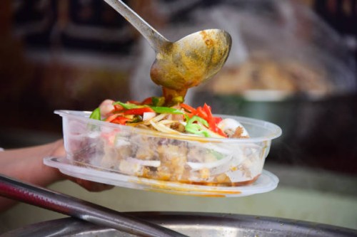 serving boiled ox head and hoof meat with seasoning - junk food stock pictures, royalty-free photos & images