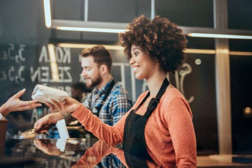 serving customers in fast food restaurant - junk food stock pictures, royalty-free photos & images