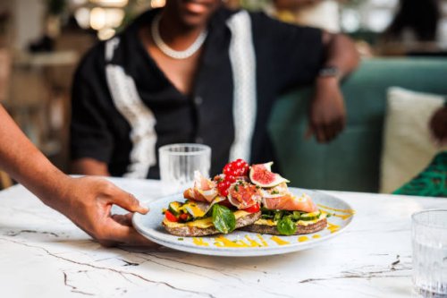 serving fresh gourmet bruschetta - food stock pictures, royalty-free photos & images