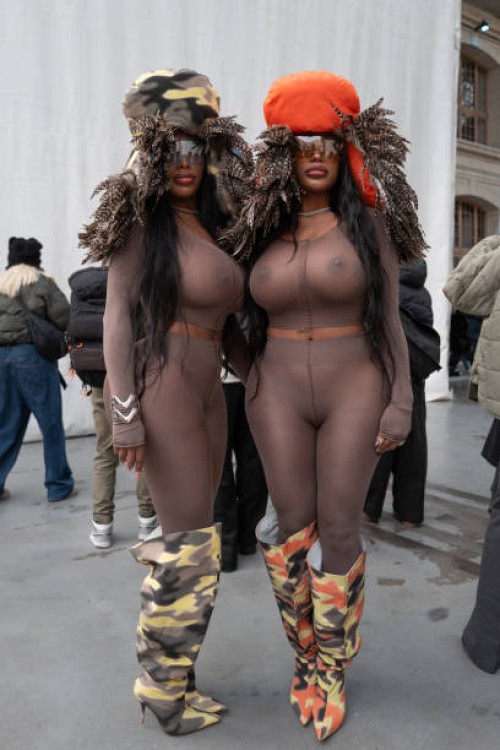 Shannon Clermont and Shannade Clermont, the Clermont Twins are seen wearing a transparent brown outfit and multi-colored boots outside Bluemarble...