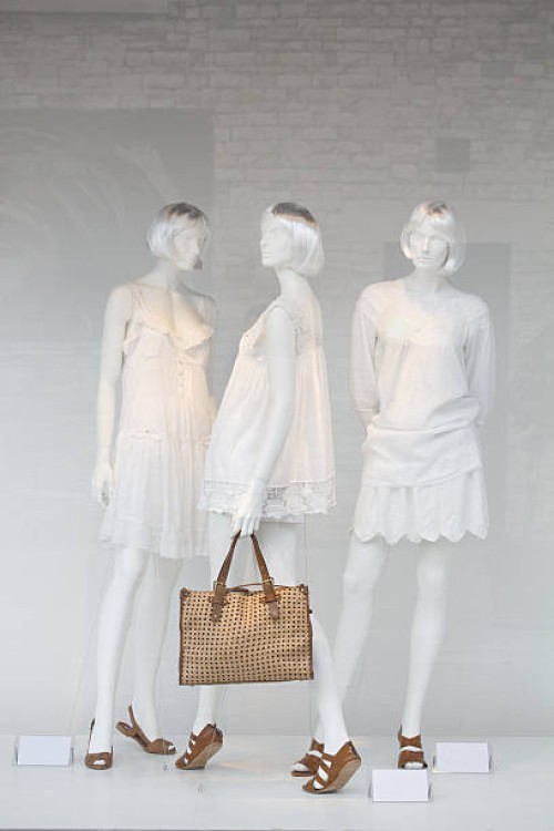 shop window mannequins in pretty clothing - fashion stock pictures, royalty-free photos & images