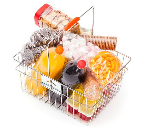 shopping basket with unhealthy food - junk food stock pictures, royalty-free photos & images