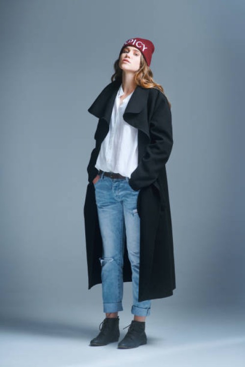 shot of a young woman posing against a grey background - fashion stock pictures, royalty-free photos & images