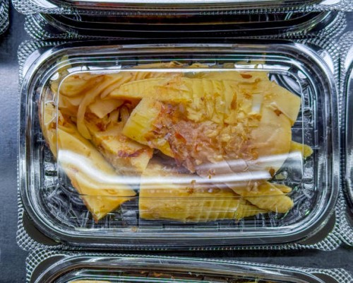 simmered bamboo shoot tips with yaizu bonito flakes - junk food stock pictures, royalty-free photos & images