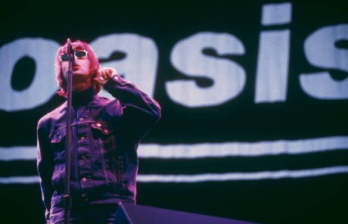 Singer Liam Gallagher performing with British rock band Oasis, UK, August 1996.