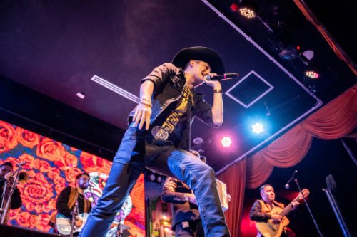 singer man singing in a music concert - concert stock pictures, royalty-free photos & images