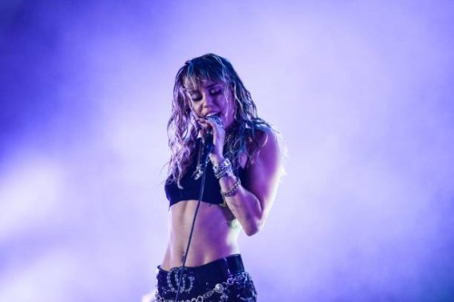 Singer Miley Cyrus performs on stage during a concert at the Sunny Hill Festival in Pristina on August 2, 2019.