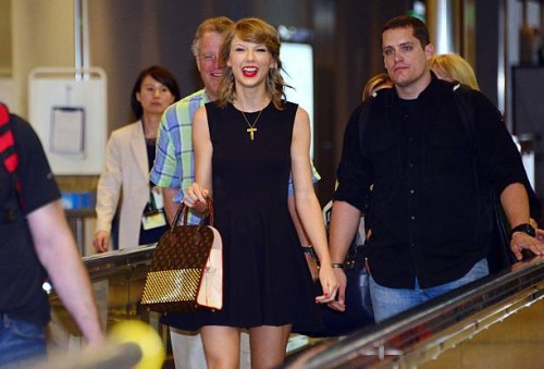 Singer Taylor Swift smiles as she arrived at Narita international airport in Narita, suburban Tokyo on May 3, 2015. Swift will have a concert in...