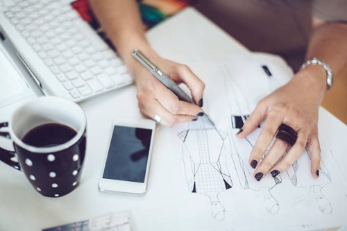 sketching a new dress - fashion stock pictures, royalty-free photos & images