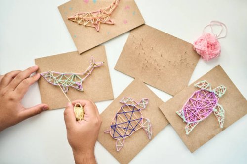 skilled hands creating string art products - nails art stock pictures, royalty-free photos & images