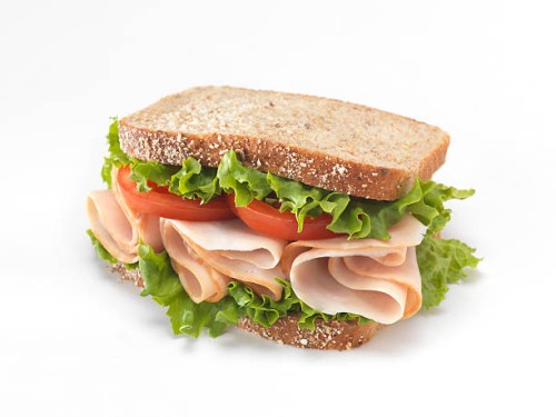 sliced smoked turkey sandwich - junk food stock pictures, royalty-free photos & images