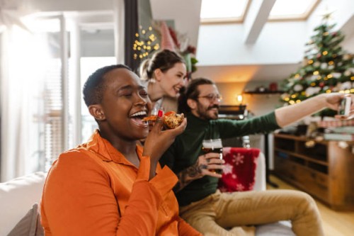 small house party during winter holidays at home - junk food stock pictures, royalty-free photos & images