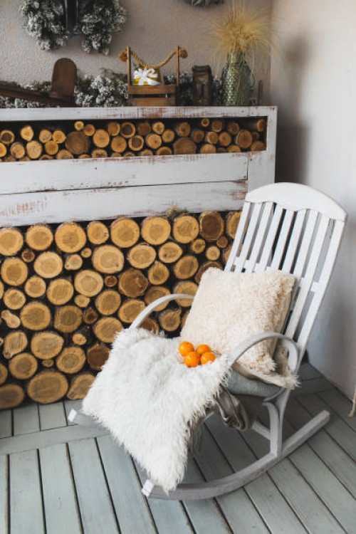 small wooden veranda with garden furnished with outdoor furniture at winter day. - garden decoration stock pictures, royalty-free photos & images