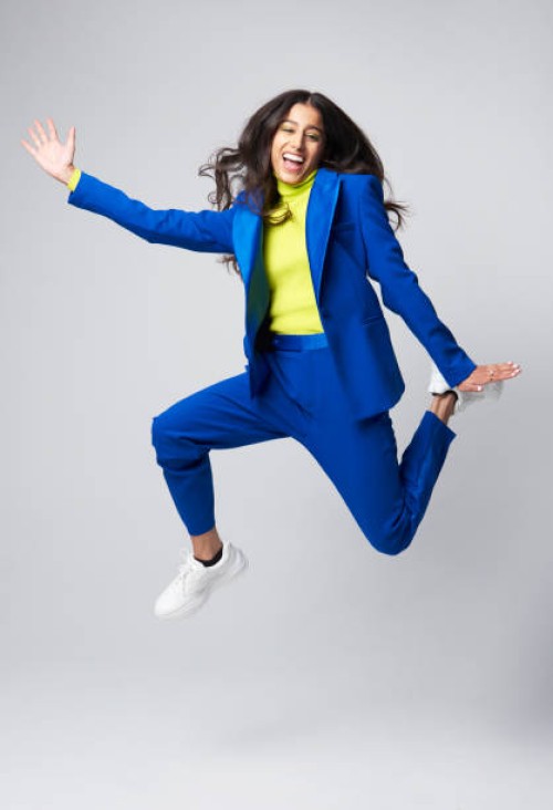 smartly dressed gen z woman jumping - fashion stock pictures, royalty-free photos & images