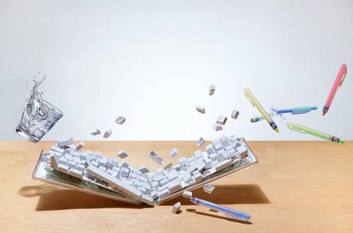 smashed up computer keyboard on office desk - home decoration stock pictures, royalty-free photos & images