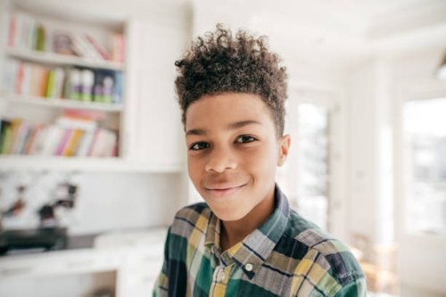 smiling at the camera. - hairstyle stock pictures, royalty-free photos & images