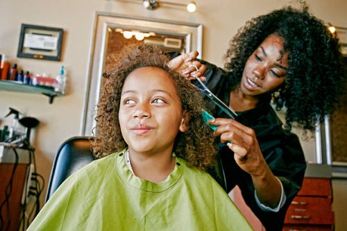 smiling hairdresser and customer in hair salon - hairstyle stockfoto's en -beelden