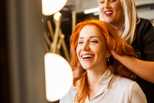 smiling woman at hairdresser - hairstyle stock pictures, royalty-free photos & images