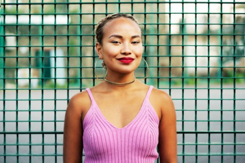 smiling woman looking at camera - fashion stock pictures, royalty-free photos & images