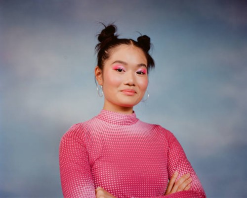 smiling young woman with pigtails - fashion stock pictures, royalty-free photos & images