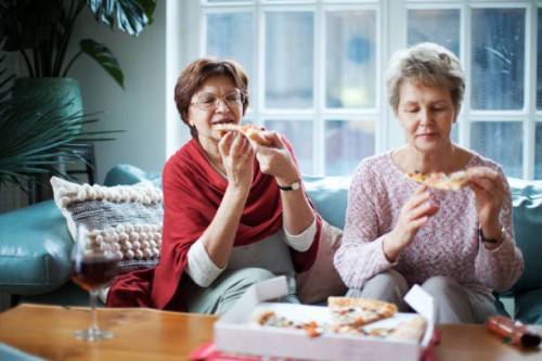 social seniors - junk food stock pictures, royalty-free photos & images