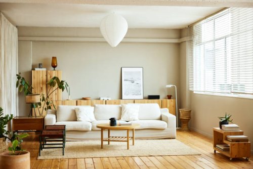 sofa with coffee table by window in living room - home decoration stock pictures, royalty-free photos & images