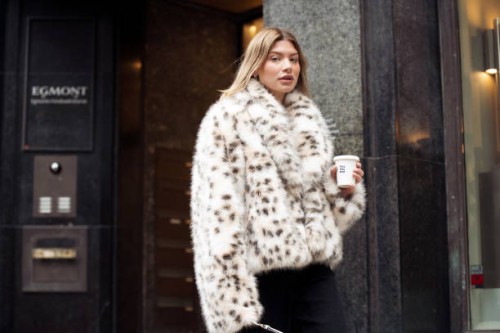 Sophia Geiss wears white and brown fur coat, black pants during the Copenhagen Fashion Week Autumn/Winter 2025 on January 30, 2025 in Copenhagen,...
